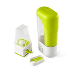 Green and white kitchen herb keeper  with detachable parts on a white background.