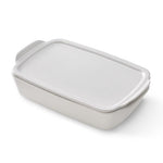 Rectangular ceramic baking dish with a lid on a white background