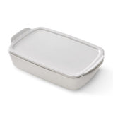 Rectangular ceramic baking dish with a lid on a white background