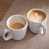 2-Piece Mug Set with coffee on tan placemat. 