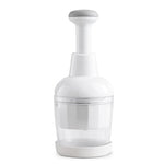 White kitchen food chopper with clear container on a white background.