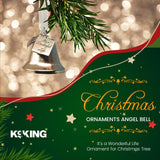 Christmas angel bell ornament with greenery on a festive background.