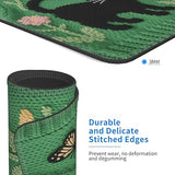 Green fabric with embroidered butterfly design and text about durable stitching edges.