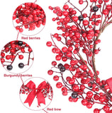 Red berries with a red bow on a white background