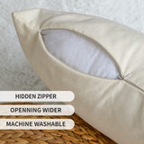 Beige pillow with a hidden zipper on a textured surface