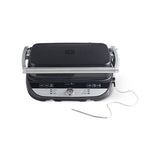 Black and silver grill with digital display on a white background.