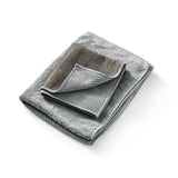 Folded, gray, dual-sided, microfiber towels on a white background.