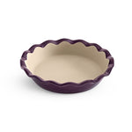 Purple, Italian Plum Stoneware Pie Plate with scalloped edge on a white background.