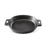Large, black cast iron skillet with handles on a white background.
