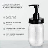 Acrylic mason jar soap dispenser with black pump on a white background.