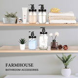 Bathroom accessories on wooden shelves with a neutral background.