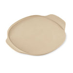Medium, beige pizza stoneware with two handles on a white background.