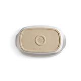 Rectangular, mini-deep stoneware covered baking dish with a logo on a white background.