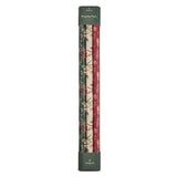 Set of three rolls of floral wrapping paper in a cylindrical holder on a white background.