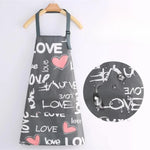 Gray apron with pink hearts and word "LOVE"