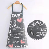 Gray apron with pink hearts and word "LOVE"