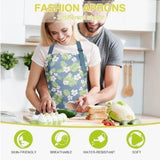Light blue and green floral apron with wide pocket and adjustable straps.