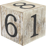 Wooden calendar block with black numbers '61' on a white background.